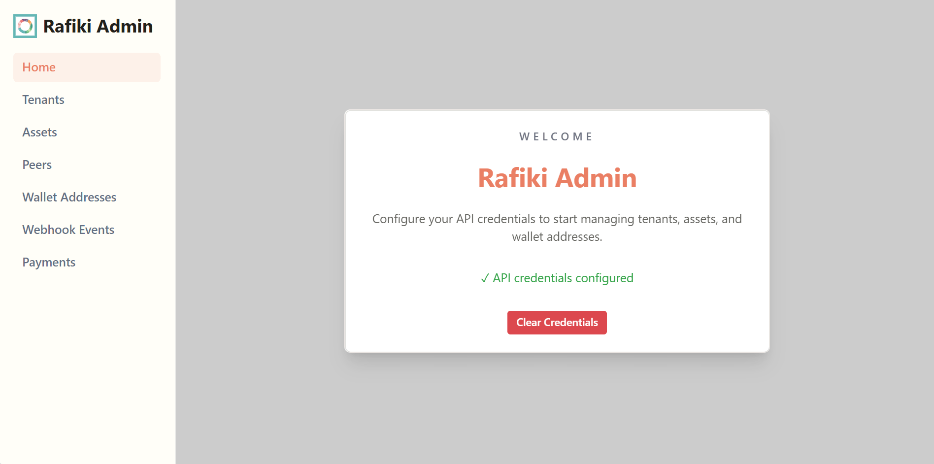A screenshot of the Rafiki Admin application user interface displaying the API credentials screen after the credentials have been entered. It shows a success message, a "Clear Credentials" button, and the full navigation menu.